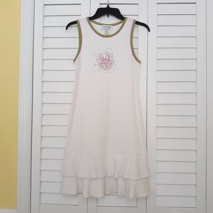 Ruffled white dress with sparkly flower